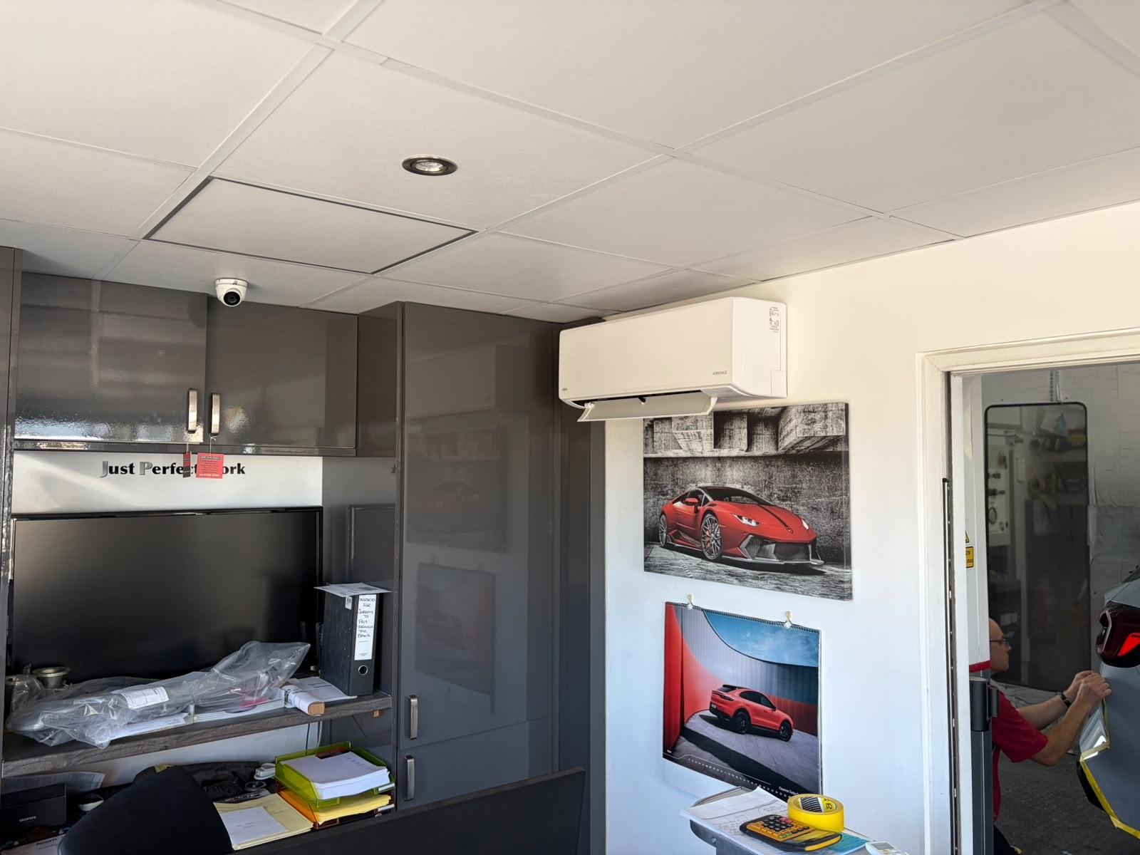 Air conditioning unit installed in a modern office after a heat load survey and system design